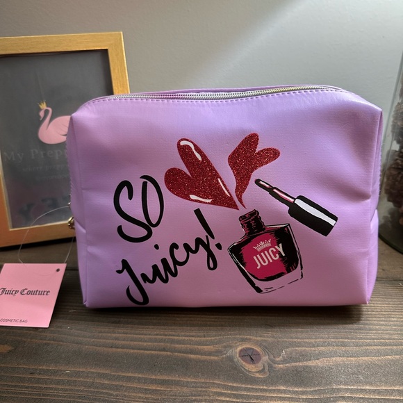 Juicy Couture Handbags - Juicy Couture Lilac Cosmetic Bag with metallic rainbow colored zipper. NWT